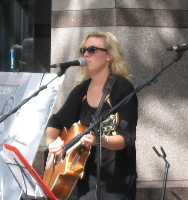 Gunn grad gone country Hannah May Allison in front of Lululemon, at Palo Alto World Music Day, 2014