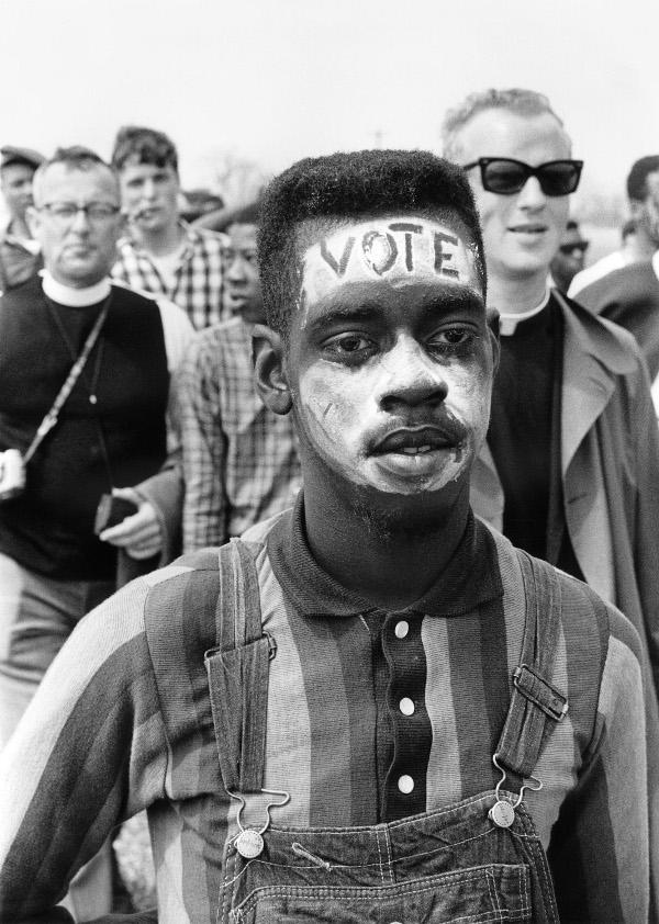 Palo Alto fans entranced by Jack O The Clock no just kidding its a photo by Matt Herron of Mississippi in 1965