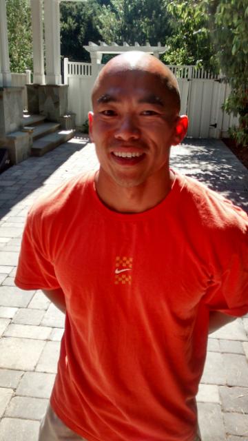 Paly grad, longtime staffer and new AD Jason Fung, at Jason Peery's yard sale, summer 2014