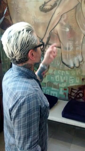 Johnny inspects his Choe at 5 Color Cowboy, 1445 the Alameda, San Jose August, 2014