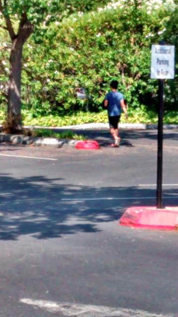 Lydia Kuo disappearing into the parking lot of Cibo on El Camino, Barron Park, Wednesday morning -- I actually have two shots of this, but didn't sit her proper. 