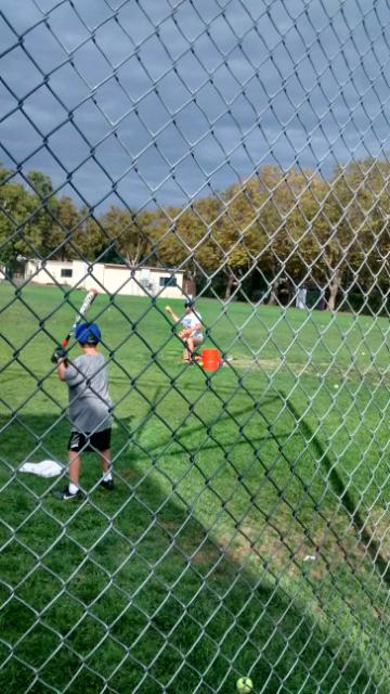This is only 9 photos, like the 9 players on baseball, and not 10 as promised but give me a break it's 10:30 and Terry has to work in a.m. -- the kid looked like Hack Wilson when dad tossed the BP at Addison recently