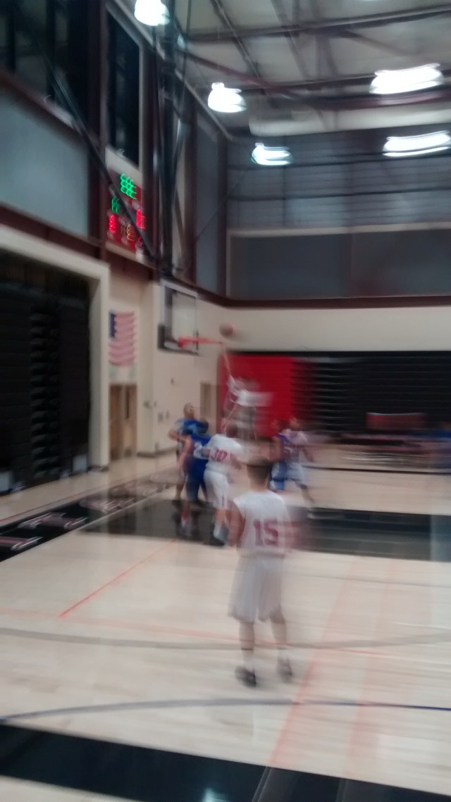 Basketball action Thurs v Summit at 3:18