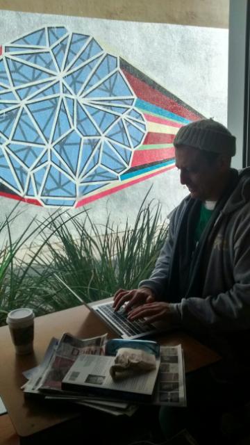 a nice Kiwi lady took this shot of me pretending to work on this article: the tell is the lack of my peepers