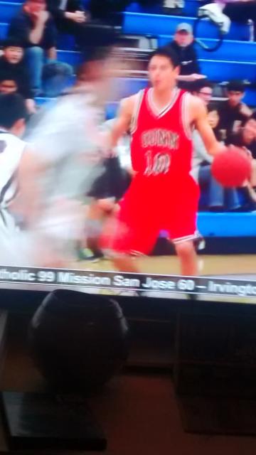 Got a color TV, so I can see...Alex Gil play basketball; that's me in the fourth row, hand on chin