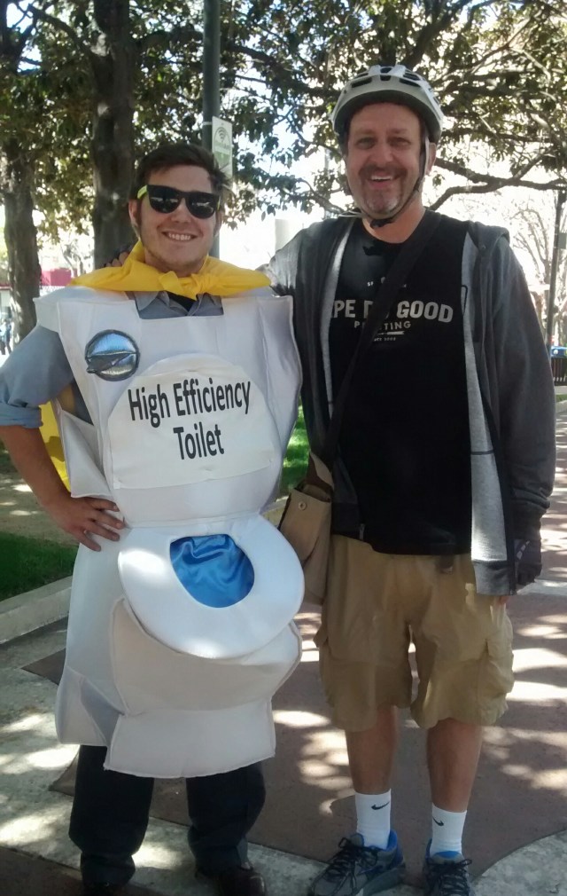 Superhero summit at palo alto city hall featuring Jordan  cowman of staff as superflush and mark Weiss as Pe Good it actually says Ape do good