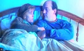 Marge congratulates Norm Gunderson for his painting of a mallard to adorn the 3 cent stamp