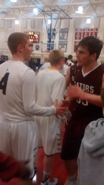 St. Francis Lancer Curtis Witt congratulates Sacred Heart Prep Andrew Daschbach after exciting 64-59 contest in CCS semifinals Tuesday at Independence High in San Jose. 