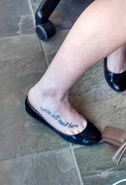 Near the spot I read "Howl"  destroyed by madness et cetera a clerk I could see from the street had a matching message on her right foot, damn the kerning