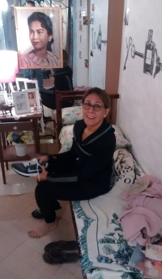 Bay Area based Pinay installation artist Terry Acebo Davis puts finishing touches on "...her room", part of Construct/s a group show, in Seattle's Chinatown I.D. which had press previews and a soiree Thursday and will be viewable and in this case sit-a-ble and even nap-a-ble for a year, but carpe diem y'all, a year could be a lifespan.